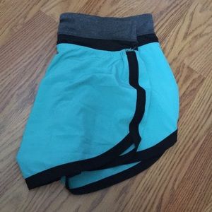 Black and green gym shorts